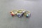 10K white gold ring with blue stones, two 14K gold ring - one with blue stones and one with red