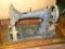Antique Davis brand treadle sewing machine is a great display piece. Cabinet closed measures 34
