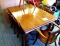 Nice smaller sized solid wood kitchen table set comes with six chairs. Table measures 5' x 3-1/2'.