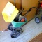 Ortho and Red Devil broad cast lawn seed and fertilizer spreaders with 20'' bins.