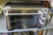 Oster toaster oven with five functions. Measures 16'' x 10'' x 10''. In working condition