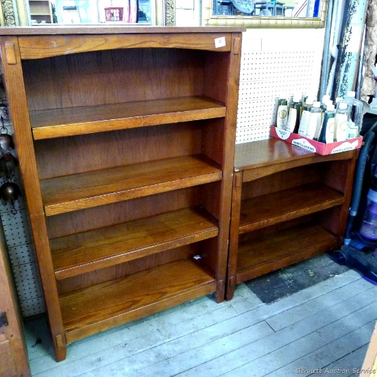 Sturdy shelving units. Larger is approx. 3' wide x 4-1/2' tall x 12" deep and has three adjustable