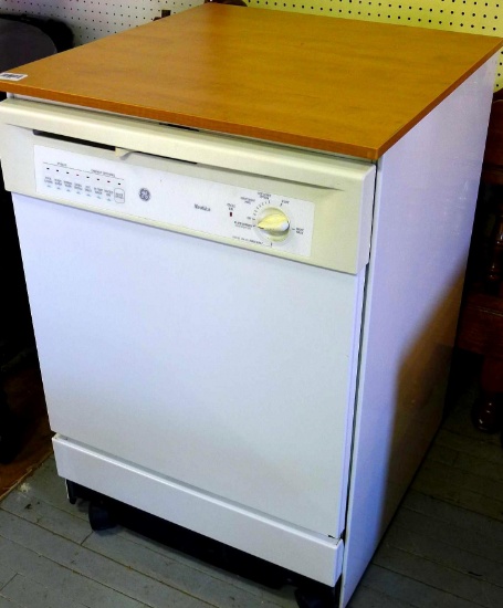 GE Nautilus dishwasher has nice top. Unit measures about 25" x 27" x 36" high. On casters for easy