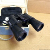 Bushnell InstaFocus 10x50 binoculars in a 12