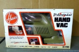 Hoover Sidewinder Hand Vac, still in box. Model no. S1156. This sparkly vacuum will make cleaning up