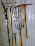 Five tine pitch fork, telescoping pruner, dirt rake, and more.