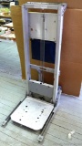 Genie 200 lbs. platform lift, model IBM5.5. Stands approx. 4' tall and is in good used condition.