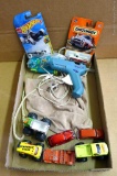Tootsie toy Jeep, Tonka, Hotwheels, Matchbox toy cars and Surebonder hot glue gun with glue sticks.
