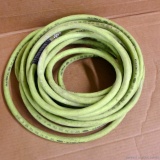 FlexZilla 3/8'' ID air 300 PSI air hose. In nice condition. The hardware is also in good condition.