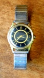 Bulova waterproof men's wristwatch is self-winding. Watch sets and both self-winding mechanism and