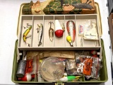 Plano Model 5410 rust proof tackle box, 13'' wide. Comes with carved fisherman, Rapala and other