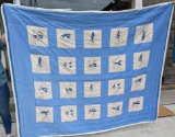 Wonderful vintage quilt has cross-stitched sailor squares. Quilt is in overall good condition and