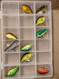 11'' Plano fishing tackle organizer with a nice assortment of lures.