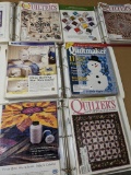 Four binders filled with nicely organized Quilter's Newsletter Magazines.