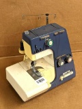 White SuperLock 503 sewing machine does not include power cord.