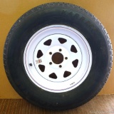 Near-new spare rim and tire for trailer, ST205/75R15 radial tire on a 5 x 4.5 rim with 3 1/8'' hub