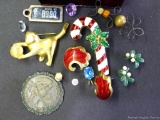 Trinkets including candy cane and cat pins, pierced earrings, more. Largest pin is 2