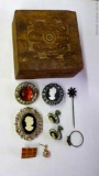 Cameo screw-post earrings, brooches, other pins, ring, more. Wooden trinket box is approx. 3