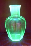 Green vaseline glass nightstand water decanter, no seeable chips. Stands 7'' tall