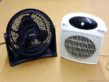 Three speed tiltable 9'' fan and a dual range space heater with thermostat, both work