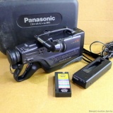 Vintage Panasonic OmniMovie VHS video camera with case, cords and charger.