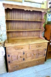 Harwood hutch is approx. 4' wide x 6' tall and 1-1/2' deep. Nice storage piece.