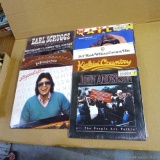 Vintage country vinyl records including Willie Nelson, Ronnie Milsap, John Anderson, Hank Williams,