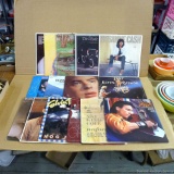 Vintage vinyl records including Rosanne Cash, Pat Boone, The Statler Brothers, Merle Haggard, Roy