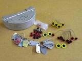 Fisherman's belt bait box, taxidermy eyes, and dog tags