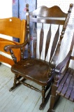 Wooden rocking chair seems smooth, measures about 27