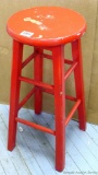 Cheery red stool is sturdy, about 29