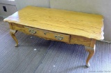 Pretty solid wood coffee table by A.A. Laun measures approx. 44