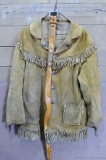 Really neat leather jacket has fringe and star medallions, plus a 47