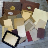 Antique and vintage photo albums and frames are empty. Print off your pics and display them in these