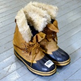 Permahyde ladies winter boots are size 8 and have leather uppers. Have a steel shank and are in good