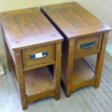 Two matching Ashley end tables are in good condition. Each table is 23