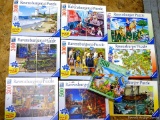 Ten 300 and 500 piece Ravensburger jigsaw puzzles. Boxes opened, pieces unverified.