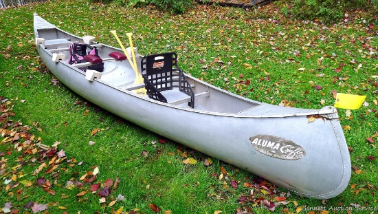 Aluma-craft model 01-17, two seat aluminum canoe. Is in good condition and comes with Feather brand