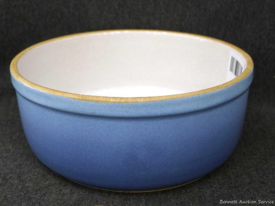 Blue and white stoneware dish; measures 8" x 3".