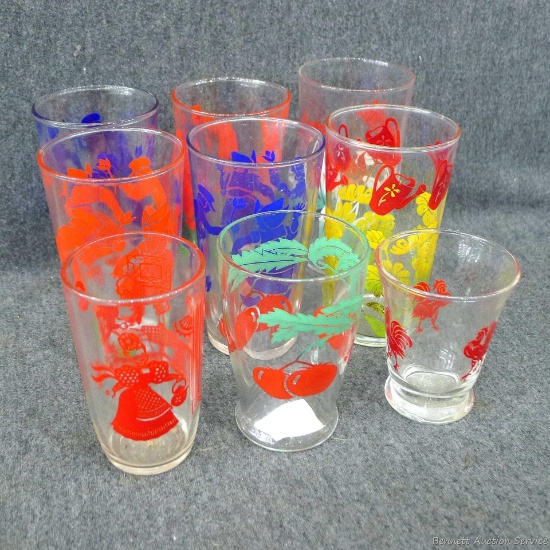Various glass juice glasses including roosters, flowers, vegetables and people; largest glass