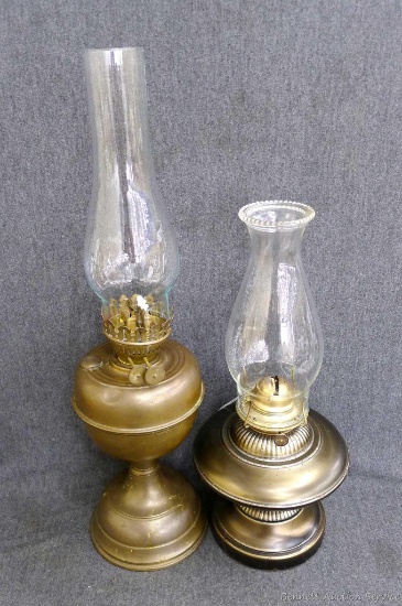 Two metal oil lamps in good shape, tallest is 21" with chimney.