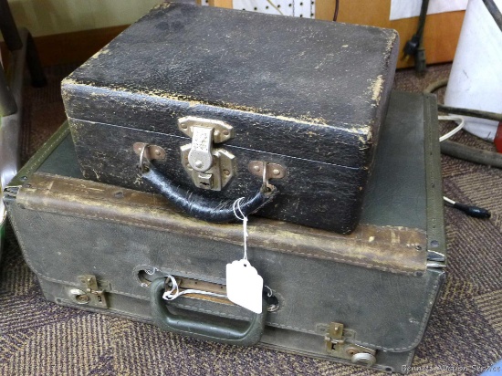 Two antique travel cases or similar. Larger looks like it may have been a brief case and measures