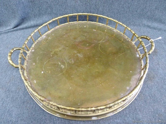 15" diameter brass tray was made in India and has a classy vintage bamboo design. Nice tray.