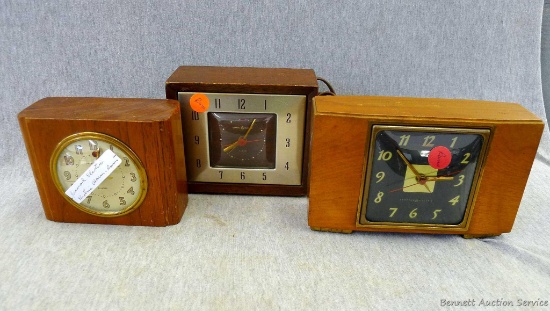 General Electric clock and alarm clocks. All clocks run, largest measures about 7 1/2'' x 5''.