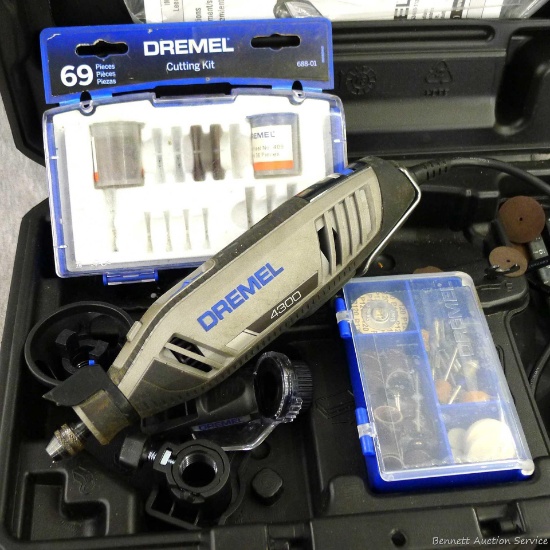 Dremel 4300 variable speed rotary tool comes with case, instructions, guard, parts to a cutting kit,