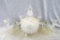 Nice glass candy dish and two candelabras. Dish measures 9'' x 6'' and candelabras measure 5'' x