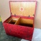 Lewyt vintage upholstered chest, measures 26'' x 15'' x 17''. Is in decent condition with some wear