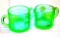 Uranium Depression glass creamer and sugar, both glow under a black light. No chips or cracks noted.