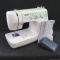Brother Model LS2350 sewing machine with case, manual and some notions. Machine turns on, lights up,