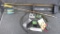 Quiver with 5 broad head Easton arrows, container filled with rangefinder, camo paint and more. A